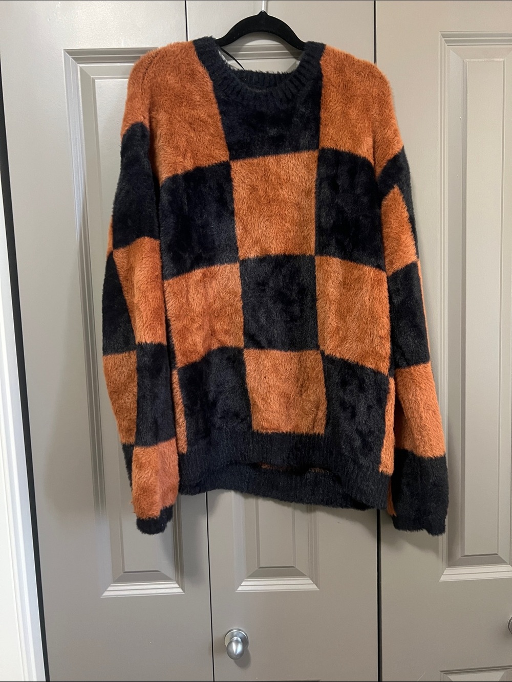 Sadie & Sage Orange and Black Checkerboard Crewneck Sweater